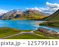 A panoramic view of the Mont Cenis Lake and French Alps under beautiful sky. 125799113