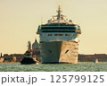 Cruise ship and tugboat in the venetian lagoon, Italy. 125799125
