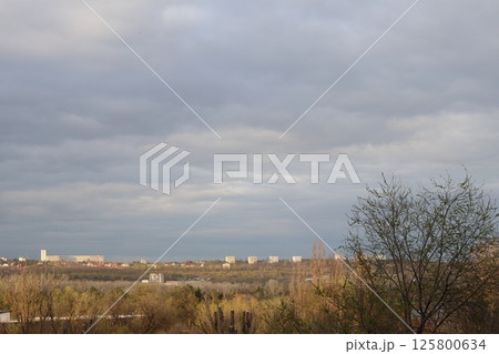 Beautiful cityscape with cloudy sky. Beautiful cityscape with cloudy sky. 125800634