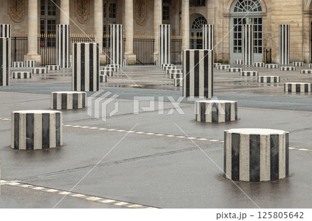 The Buren Columns (the two trays) installed in the Honor courtyard of the Palais Royal. 125805642