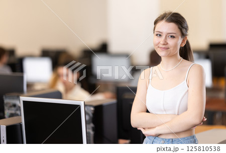 Girl in computer design and information technology classroom Girl in computer design and information technology classroom 125810538