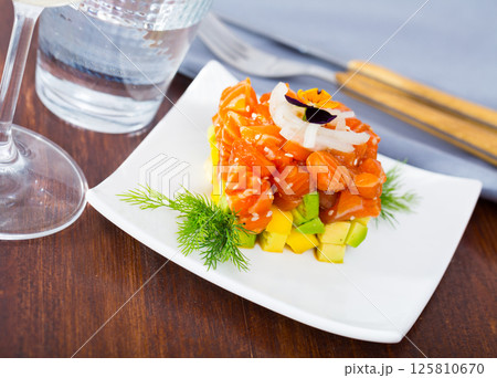Tasty tuna tartar with avocado Tasty tuna tartar with avocado 125810670