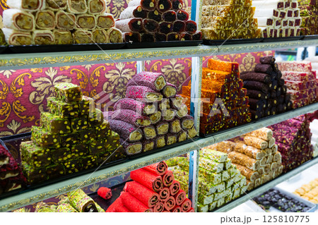 Turkish delight with multi-colored sprinkles, almonds and coconut Turkish delight with multi-colored sprinkles, almonds and coconut 125810775