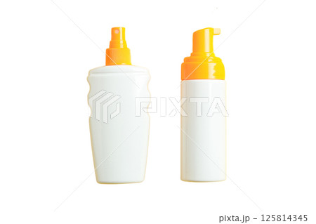 Sunscreen bottles ready for summer travel and skin protection, isolated on white Sunscreen bottles ready for summer travel and skin protection, isolated on white 125814345