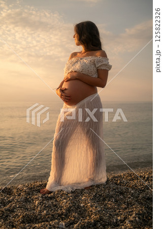 The Elegant Shape Of A Pregnant Woman Belly  125822326