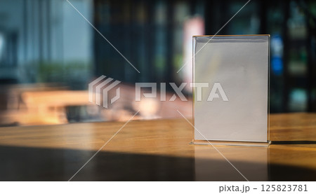 Stand Mock up Menu frame tent card blurred background design key visual layout A modern acrylic stand on the counter displays Stand Mock up Menu frame tent card blurred background design key visual layout A modern acrylic stand on the counter displays 125823781