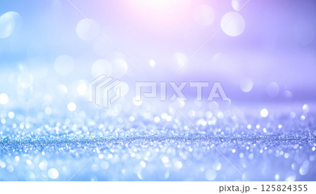 dreamy abstract background featuring shimmering glitter and soft bokeh in pastel blue and violet tones, creating frosty glow that evokes sense of wonder and tranquility 125824355