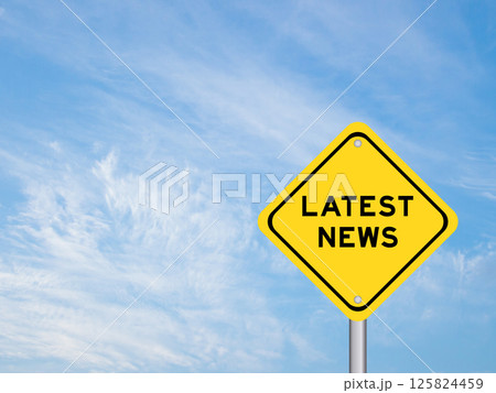 Yellow transportation sign with word latest news on blue color sky background Yellow transportation sign with word latest news on blue color sky background 125824459