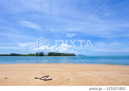 Beautiful sandy beach and sea in sunny day,Blue sky in good weather day, Beach sea space area nature background 125825802