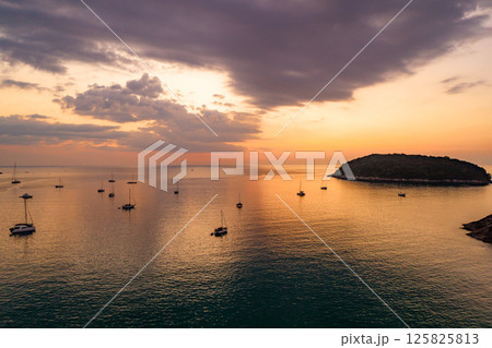 Nature beautiful light sunset or sunrise over sea surface,Colorful sunset sky with clouds and waves in the ocean,Wide angle sea background Nature beautiful light sunset or sunrise over sea surface,Colorful sunset sky with clouds and waves in the ocean,Wide angle sea background 125825813