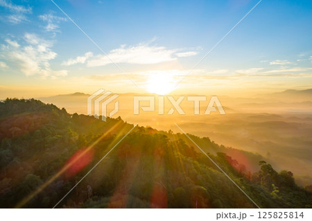 Nature beautiful light sunset or sunrise over mountains,Colorful sunset sky with clouds landscape,Wide angle nature background 125825814