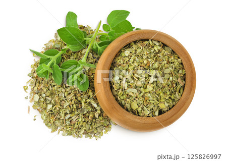 Oregano or marjoram leaves fresh and dry in wooden bowl isolated on white background 125826997