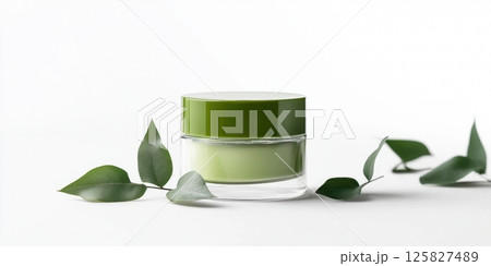Face cream jar. Mockup of white cosmetic jar with green lid isolated on a white background. Copy space. Beauty product branding template. Plastic container skincare medicals, lotion bottle. Body care 125827489