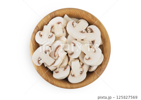 Fresh mushroom champignon slices in a wooden bowl isolated on white background. Top view. Flat lay 125827569
