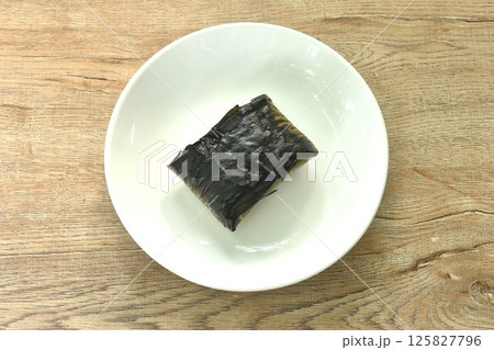 grilled chop pork curry in banana leave Thai northern food on plate 125827796