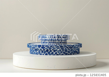 3D rendering of blue and white podiums with round shapes on an isolated background, in a minimalist style with a blue color theme, professional photoshoot for an advertising campaign 125831405