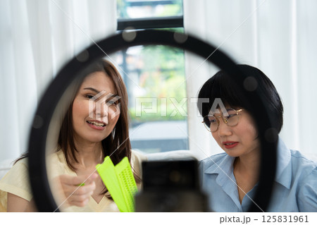 Asian Women online streaming for teaching braille writing to teach parents of visually impaired individuals to help produce reading and teaching materials. Concept of Learning and Coexistence 125831961