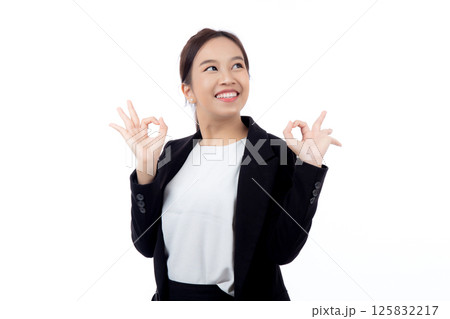 Portrait young asian business woman in suit gesture ok with confident and achievement isolated. 125832217