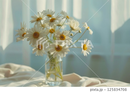 Tranquil Morning Light with Fresh Daisy Arrangement on Window Sill 125834708