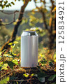 Eco-Friendly Beverage Can in Sunlit Forest Natural Setting 125834921