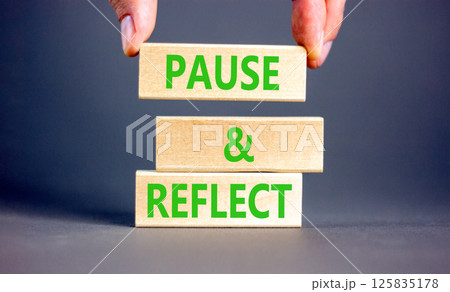 Pause and reflect symbol. Concept words Pause and reflect on beautiful block. Businessman's hand. Beautiful grey background. Business motivational lifestyle pause and reflect concept. Copy space. Pause and reflect symbol. Concept words Pause and reflect on beautiful block. Businessman's hand. Beautiful grey background. Business motivational lifestyle pause and reflect concept. Copy space. 125835178