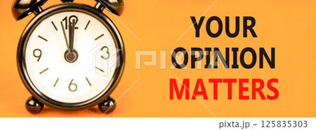 Your opinion matters symbol. Concept words Your opinion matters on beautiful orange paper. Beautiful orange background. Black alarm clock. Business your opinion matters concept. Copy space. Your opinion matters symbol. Concept words Your opinion matters on beautiful orange paper. Beautiful orange background. Black alarm clock. Business your opinion matters concept. Copy space. 125835303