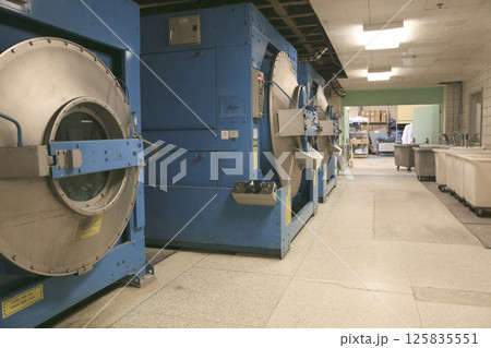 Row of textile dyeing machines. Row of textile dyeing machines. 125835551