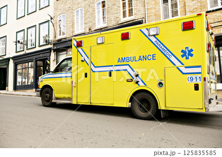 An ambulance car on the side street 125835585