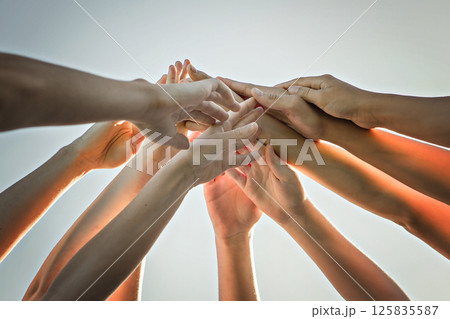 many hands over a nice sky, team work many hands over a nice sky, team work 125835587