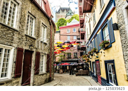 Lot of Umbrellas in Petit Champlain street Quebec city, Canada Lot of Umbrellas in Petit Champlain street Quebec city, Canada 125835623
