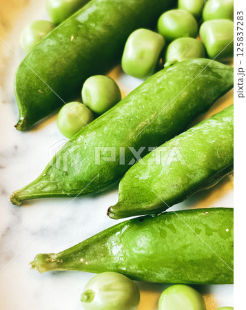 Harvest organic vegetables green peas. Harvest organic vegetables green peas. 125837283