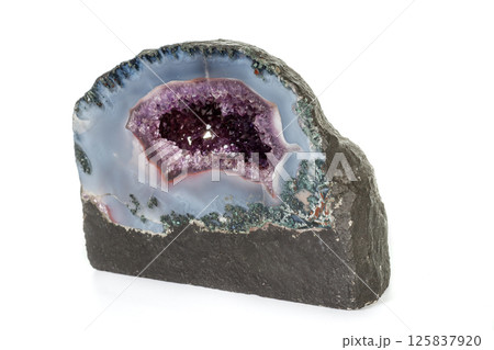 Amethyst Crystal Druse macro mineral on white background Amethyst Crystal Druse macro mineral on white background 125837920
