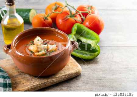 Traditional Spanish Gazpacho soup in bowl on wooden table 125838185