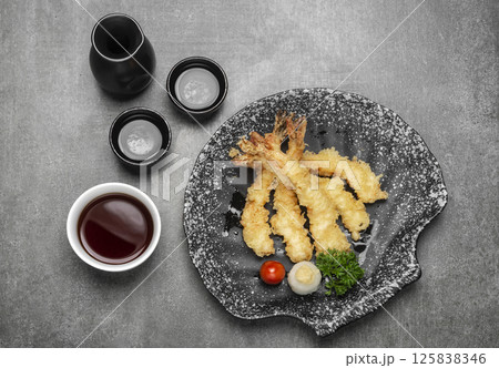 Crispy Japanese Ebiten Shrimp Tempura on grey background Crispy Japanese Ebiten Shrimp Tempura on grey background 125838346