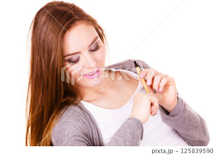 Woman charming girl long hair looking at camera Woman charming girl long hair looking at camera 125839590