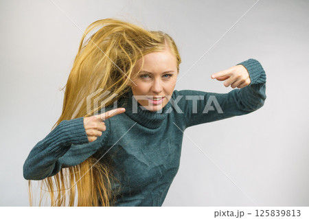 Angry female pointing with fingers Angry female pointing with fingers 125839813