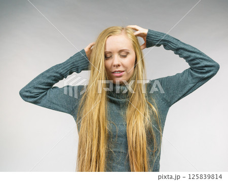 Girl with blonde long hair Girl with blonde long hair 125839814