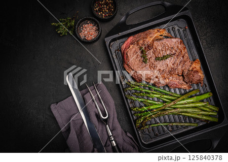 Beef grill steak with green asparagus 125840378
