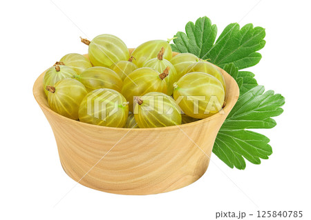 Green gooseberry in wooden bowl isolated on white background with full depth of field 125840785
