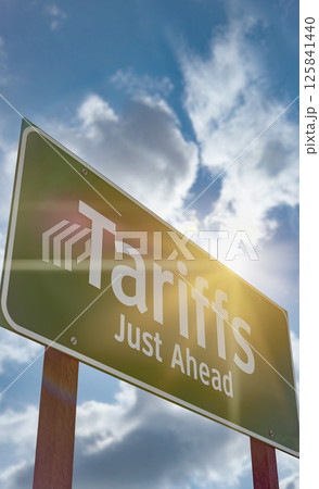 Tariffs Just Ahead Green Road Sign Against Clouds and Sky. 125841440