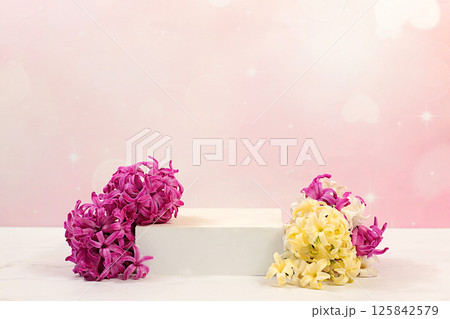 Empty product podium and fresh live hyacinths, abstract beautiful flower arrangement. Stage for business concept. Minimal modern aesthetic and elegant beauty concept, flower banner. 125842579