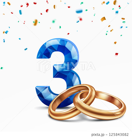 Blue number 3 and golden wedding rings. 125843082