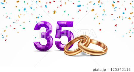 Purple number 35 and golden wedding rings. 125843112