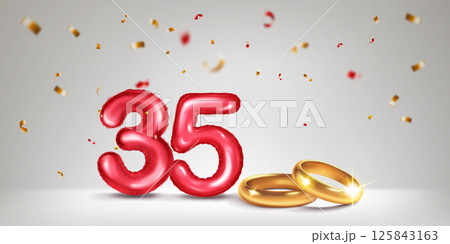 Red number 35, gold wedding rings and confetti. 125843163