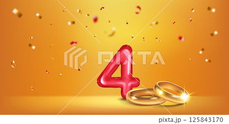 Red number 4, gold wedding rings and confetti. 125843170