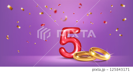 Red number 5, gold wedding rings and confetti. Red number 5, gold wedding rings and confetti. 125843171
