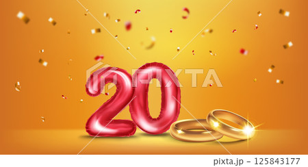 Red number 20, gold wedding rings and confetti. Red number 20, gold wedding rings and confetti. 125843177