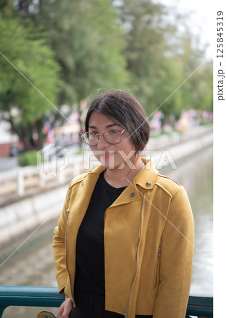 Woman (LGBTQ) posing outdoor fashion style 125845319