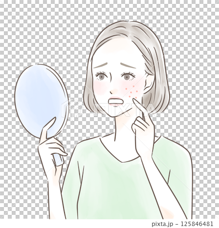手鏡を見て湿疹にショックを受ける女性 125846481