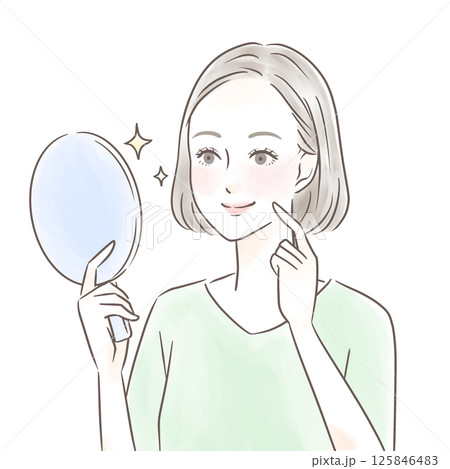 手鏡を見て綺麗な肌に感動する女性 手鏡を見て綺麗な肌に感動する女性 125846483
